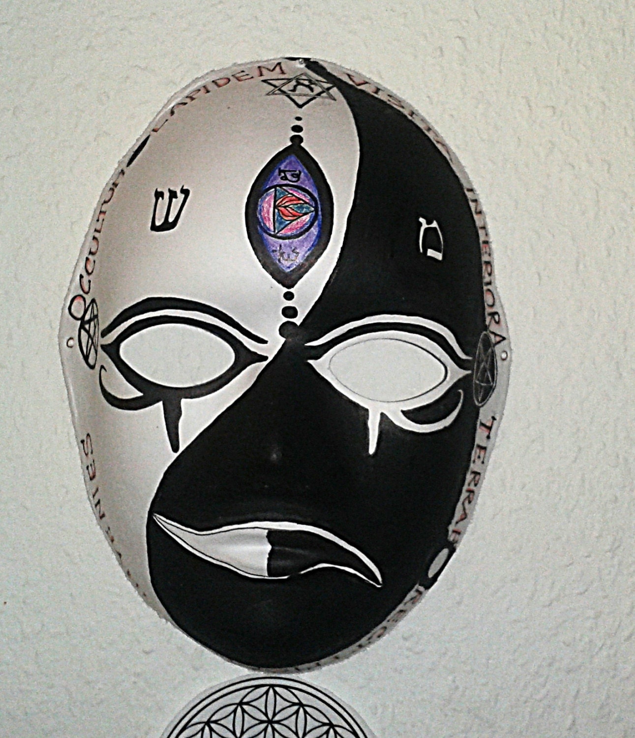 magic mask ritual ceremonial magic yin yang eye of Horus