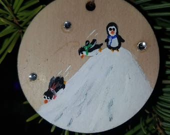 Penguins sledding handpainted christmas ornament