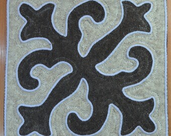 Natural felt mat, cover for chair, size 38 x 38 cm.
