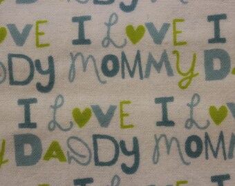 I love Mommy I love Daddy Green Blue on white 100% cotton flannel 41"-44" wide