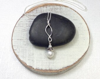 Sterling infinity necklace. Wedding jewelry. Pearl necklace. Bride jewelry. Mother's gift. Bridesmaid. Modern pearl jewelry. Infinity charm
