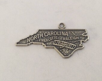 Sterling silver North Carolina map charm vintage #682 s