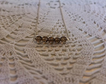 short silver necklace with smoky quartz