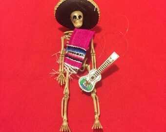 Pink Sarape day of the dead skeleton ornament with a guitar #14