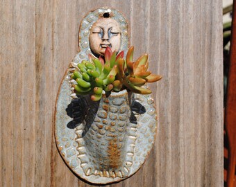 ceramic wall planter figurative garden art sculptural plant holder