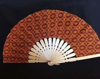 Sturdy hand-held fan. Instant cooling. Perfect size for handbags, glove-boxes or on a bench. The perfect 10 inches for any woman.