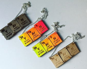 YArN periodic table element necklaces
