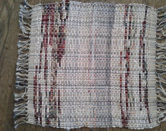 White or light yellow hand woven placemats