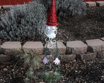 Sleepy Garden Gnome 2 plant cage is an adorable addition to any garden.