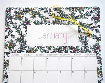 2017 Wall Calendar, size 8.5x11 inches featuring 12 different floral illustrations in green, fuchsia, orange, yellow, purple and lavender