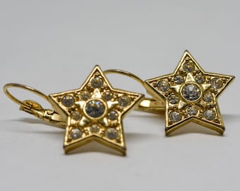 Gorgeous gold tone star earrings