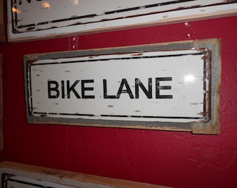 Recycled wood framed metal street sign-bike lane