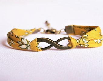 Mustard yellow floral infinity bracelet