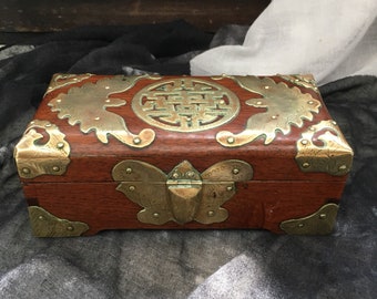 Very old copper-carved mahogany box.