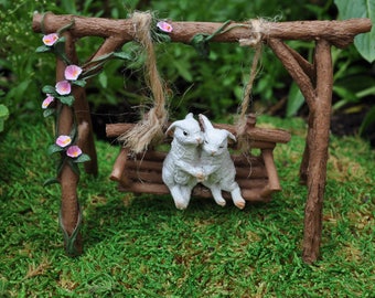 Cuddlng Bunnies on Swing
