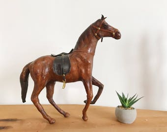 leather covered horse figurine