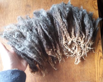Black curly locks. 3-5 inches