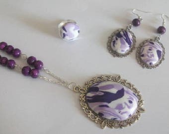 Set a long necklace, earrings and ring