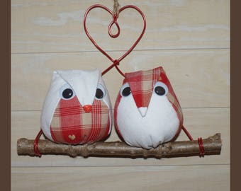 owls fabric on a branch of wood