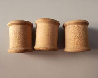 Old wooden thread coils