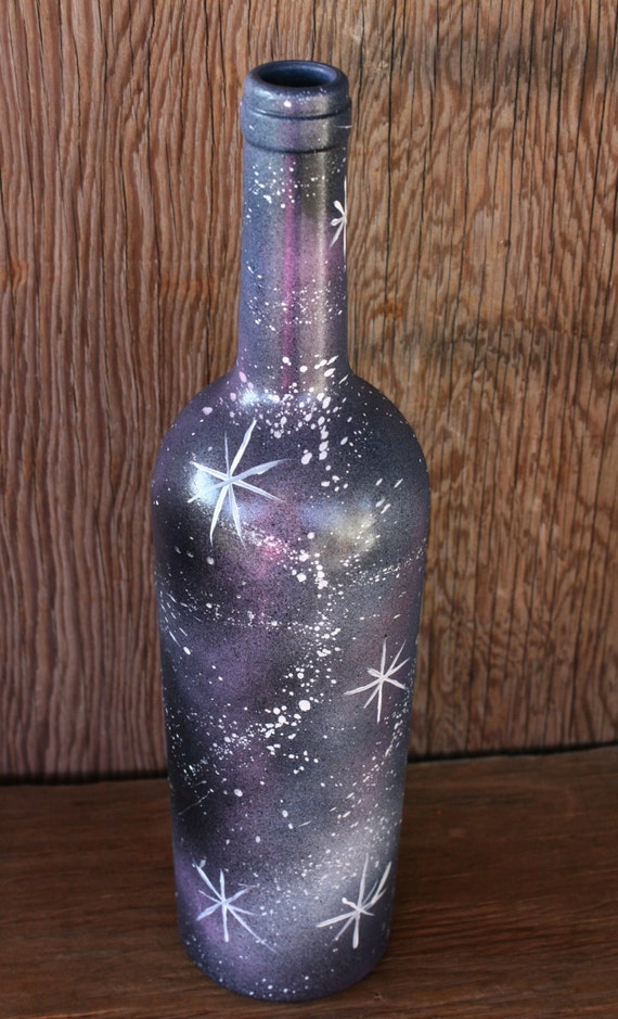 Items similar to Galaxy hand painted wine bottle vase on Etsy