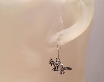 Witch on broom earrings