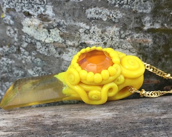 Bright And Beautiful Yellow Clap And Crystal Amulet