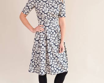 Navy floral dress with pleated skirt