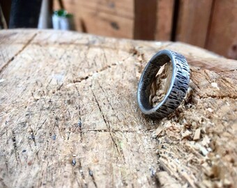 Scratch effect thin band hand forged iron ring