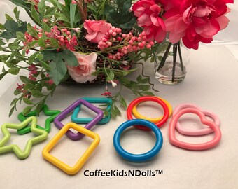 Closeout // Solid Shape Rings // Assorted // Baby Toys // Clink Rings // Noise Makers // Toy Insert // Craft Supplies // Toy Making
