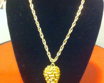 Acorn pendant gold tone