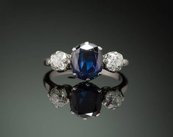 Vintage natural sapphire and diamond three stone platinum trilogy ring