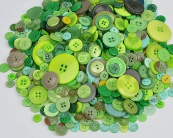 25 buttons in different sizes in shades of green