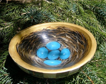 Wooden bowl with robin's nest and black and white checks