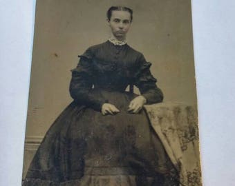 Antique Tintype Woman Sitting with Arm on Table.