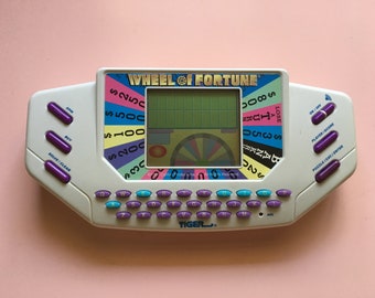 Jeu électronique poche 1995 tiger Electronics roue de la Fortune - jeu vidéo jeu montre - jeux vintages-
