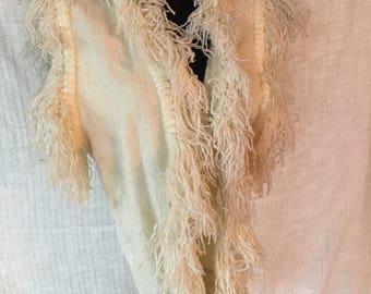 Woven fiber vest with fringe