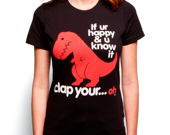Sad T-Rex (GT2339-102BLK) Girl's Tee. Funny dino shirt, funny t-shirt, red dino, dinosaur shirts, T-Rex tees, clap your hands tee.