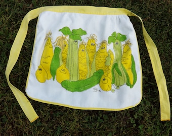 Wonderful vintage anthropomorphic vegetable terry cloth half apron in white, green, and yellow!