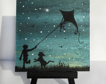 Little boy with a dog and a kite - night - silhouette - miniature miniature limited edition print mounted on wood