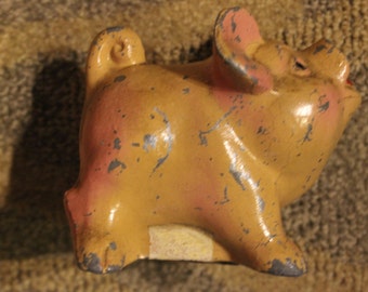 Vintage Metal Cast Orange-Colored Piggy Bank