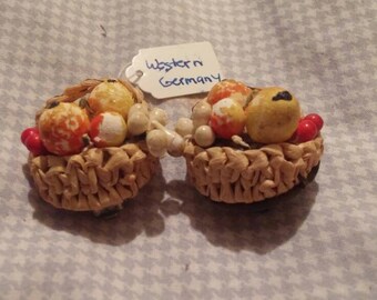Vintage West Germany clip on earrings. Earrings depict basket of fruit.1 1/2".