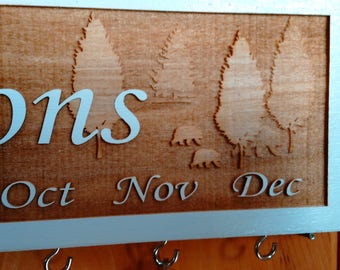 Custom and engraved family celebration Board with woodland creatures, multi layers of engraving on wood (coloredWoodland_b).