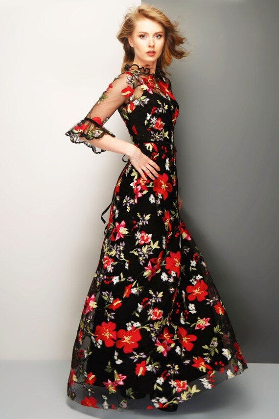 Floral lace maxi dress with high neck and sleeve ruffels
