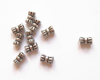 20 beads 6 mm silver spacer metal bowtie