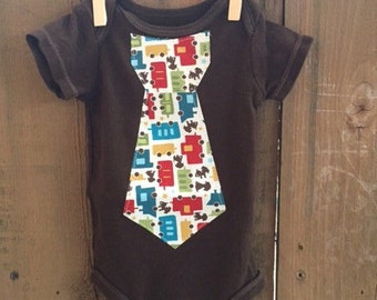 Newborn Bodysuit with a Puppy/Train Iron On Tie