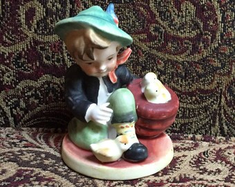 Farm Boy with Baby Chicks Figurine