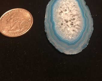 Blue agate slice drilled