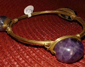 Round amethyst three stone Bangles.