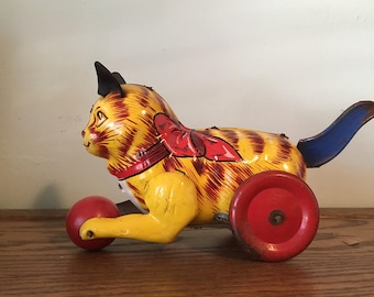 vintage Marx tin litho toy cat with friction driven tail